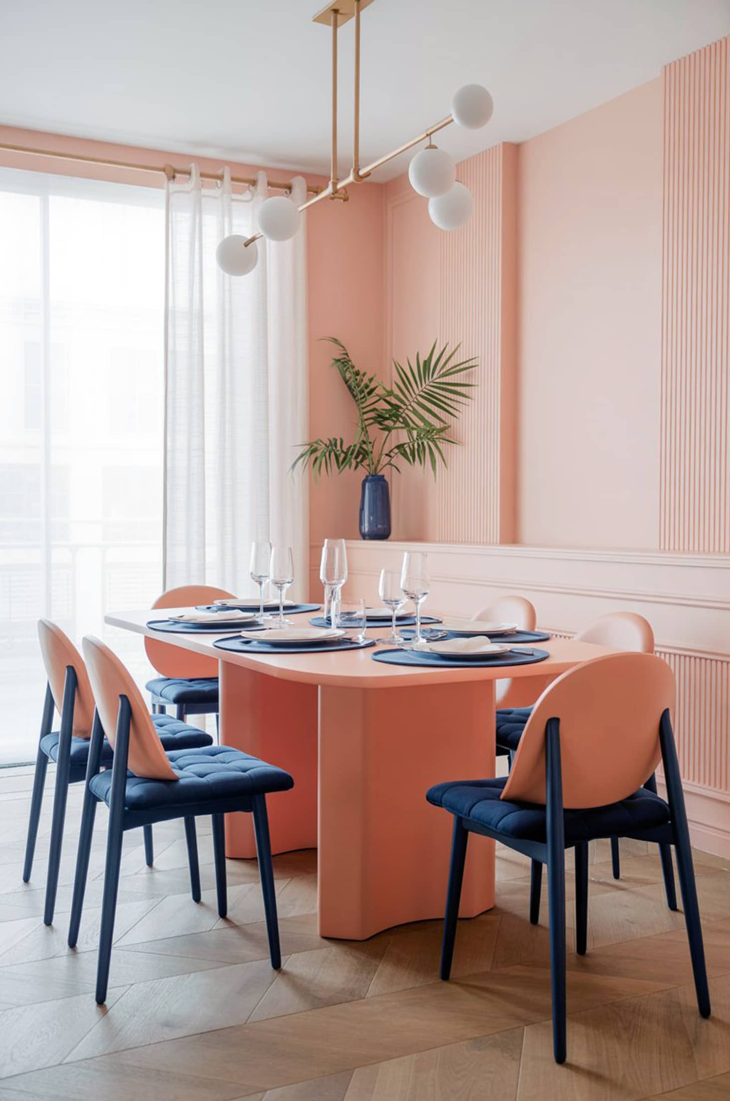 Chic coral & navy dining room modern pastel furniture with blue accents