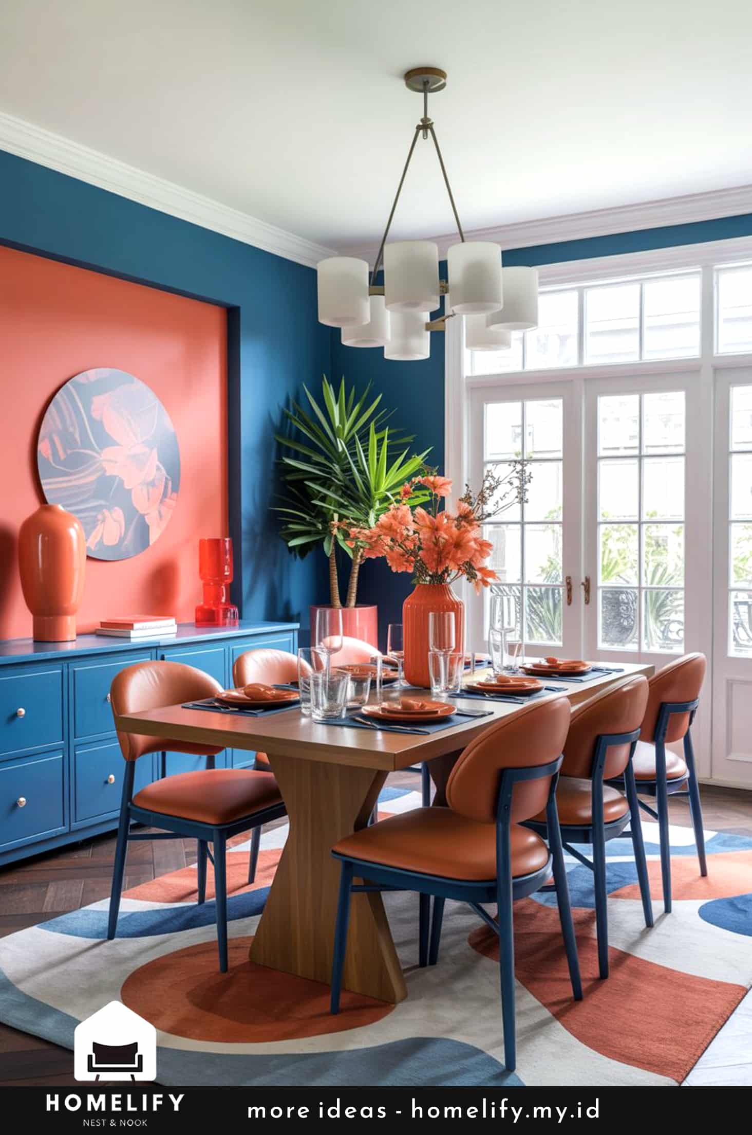 Vibrant dining room with coral & navy accents and modern touches